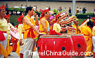 The dragon dance always starts with the beats of roaring drums.
