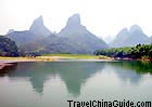 Li River decorated with little hills.