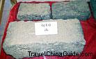Bricks of the Yangguan Pass are black, exquisite and hard as stones in quality. It was once the bricks of the wall of the Yangguan Pass, hence its name "Bricks of the Yangguan Pass". 0013003