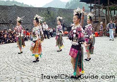 "Bronze drum dance in a circle."