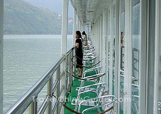 Passengers enjoying the scenery on the balcony