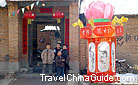 A well-decorated lantern is placed in front of the gate to add festive atmosphere. 0014351