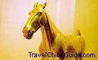 Shinning gilt bronze horse of the Western Han (206BC-8AD), excavated from the Maoling Tomb, Xingping, Shaanxi Province. 0028736