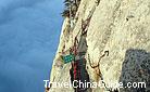 Dare you climb through this narrow path leading to the summit of the Mt. Huashan?