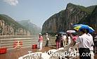 A luxurious cruise ship passing through the magnificent Qutang Gorge