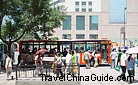 Travellers come and go at the bus station. 0031128