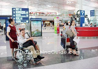 A disabled traveler in an airport in China