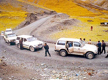 Jeeps on the rugged road in Tibet