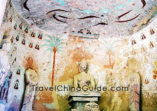Colorful fresco and buddha statues