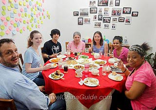 Our Guests Dining in a Chinese Family