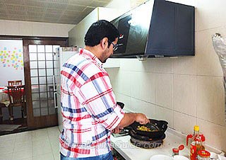 Mr. Fawaz Turki S AL Hajri in the Kitchen