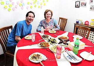 Fred and Elizabeth Dining at a Local Family