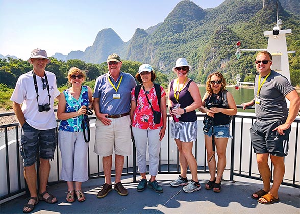 Tourists Taking a Cruise on the Li River Tourists Taking a Cruise on the Li River
