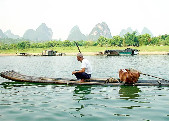 Fisherman and Cormorants