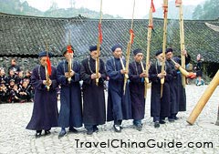 Blow Lusheng, a kind of music instrument of Miao Nationality