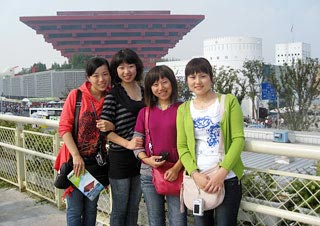 Staff of TravelChinaGuide.com in Shanghai Expo Site