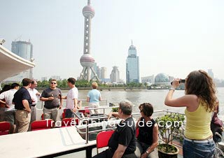 Tourists Enjoy their Huangpu River Cruise