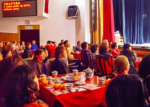 Visitors listen to Beijing Opera