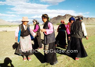 Tibetans dance in the Harvest Festival