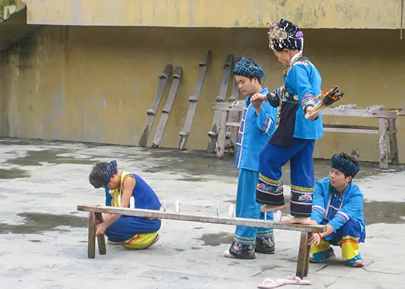 Local people wash clothes at the bank of Tuojiang River 