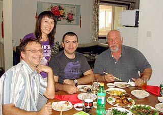 Mr. Razvan Adrian Toparcean, Mr. Vasile Dan Gorgan & Mr. Victor Adrian Schiopu Having Meal in a Local Family    