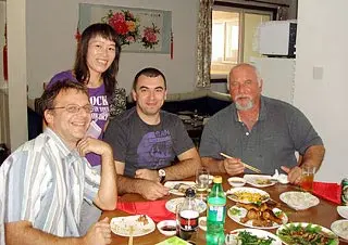 Mr. Razvan Adrian Toparcean, Mr. Vasile Dan Gorgan & Mr. Victor Adrian Schiopu Having Meal in a Local Family    