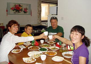 Mr. Zoltan Racz's Family Having Meal with a Chinese Hostess