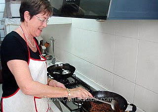 Ms. Betty Howe Yee Meredith Cooking Shredded Pork With Sweet Bean Sauce