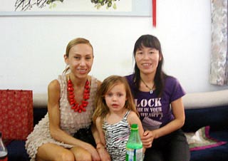 Ms. Gabriela and Her Daughter with a Chinese Hostess