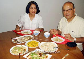 Mr. Jairaj Jairam & Ms. Manjula Jairam Having a Meal in a Chinese Family