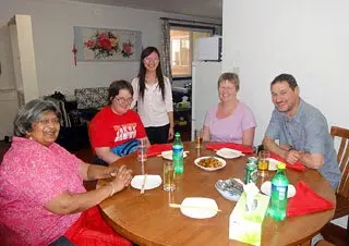 Our Guests Dining in a Chinese Family