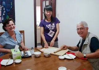 Our Guests Rolling the Wrappers for the Dumplings