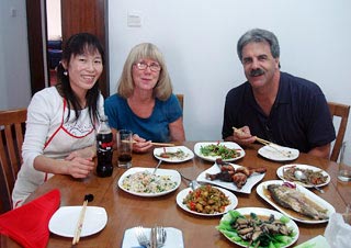 Ms. Peggy Joanne Kistler & Mr. Douglas Steven Kistler Having Meal in a Chinese Family