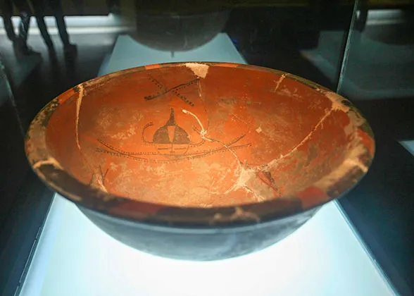 Pottery Basin with Human Mask and Fish Pattern