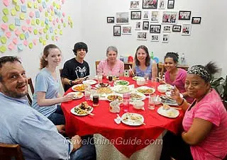 Our Guests Dining in a Chinese Family