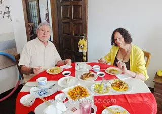 Carlos & Maria at the Dining Table in a Chinese Family