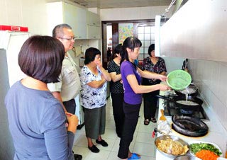 Our Guests Learn to Make Chinese Dishes