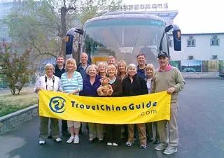 Our Clients in front of TCG's Tourist Bus