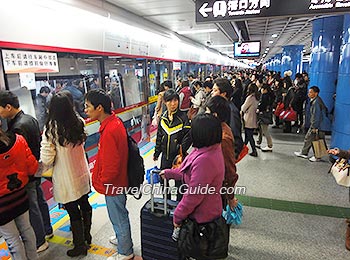 Passengers are waiting for subway train.