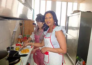 Ms. Cynthia Luis Learning to Make Sweet and Sour Pork Fillet