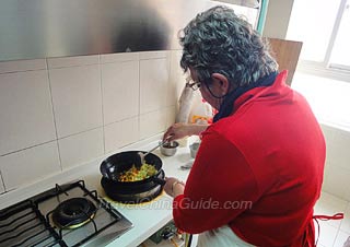 Ms. Ellen Cooking Fried Egg with Black Fungus