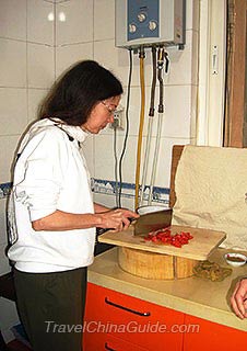 Ms. Kathy Lynn Grier Preparing the Tomatoes