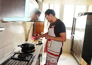 Mr. Guan Ming Teo in the Kitchen