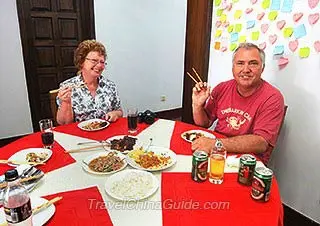 Andrew & Marilyn Dining in a Local Family