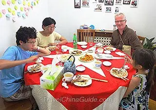 Our Guests Having Dinner in a Local Family