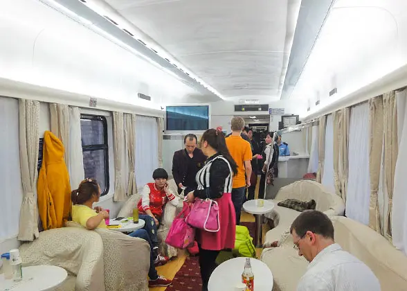 Passengers Enjoy Their Meal in The Dining Car