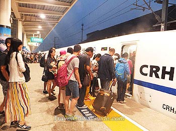 Passengers Getting on an Overnight Train