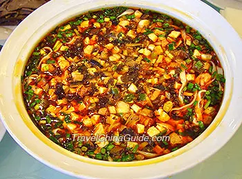 Where in the World is Gaspar Sancoche? Belting down belt noodles at Xian Noodle Factory, among other places.