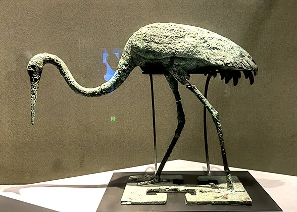 A Bronze Crane Bending Its Neck