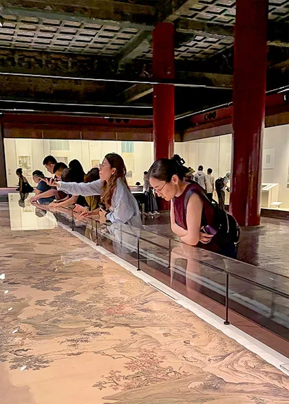 Admiring the Exhibit in the Main Hall